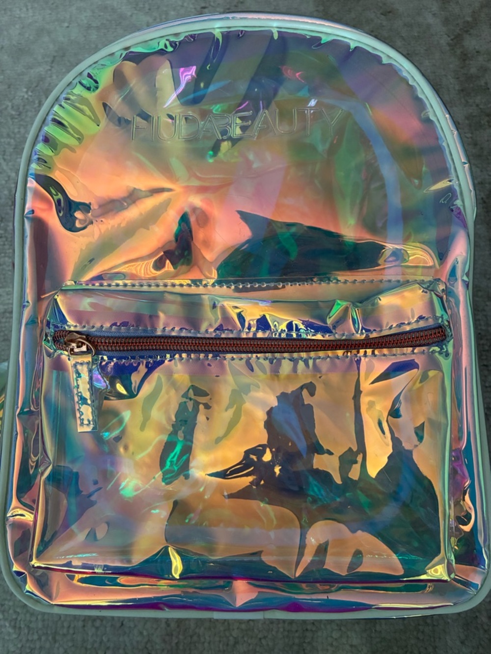 HUDA BEAUTY Iridescent Holographic Pouch in Pink, Purple, Green, Gold